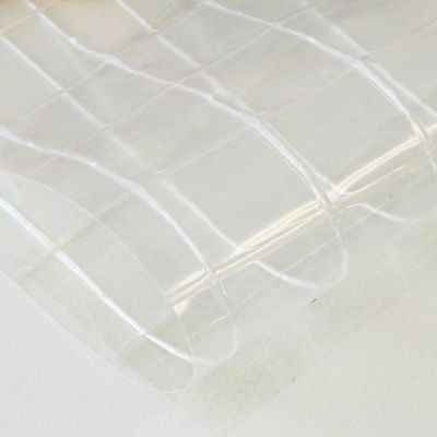 平岡織染 エコターポ H-202 非塩ビ透明糸入り 0.27mm厚 2050mm巾×30m乱巻 ロールタイプ (原反)